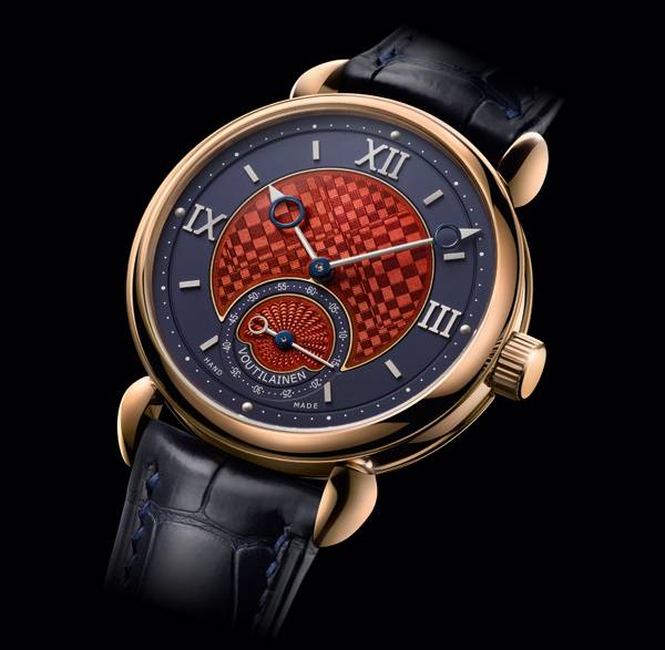 GMT EMAIL TROMPE-L'OEIL de Voutilainen: El Voutilainen GMT Email Trompe-L' oeil, inspirado por Vasarely, es la perfecta realización de la evolución técnica y estética extrema de los relojes de Kari Voutilainen. Totalmente diseñado, construido, producido, acabado y montado en el propio taller del maestro, el movimiento tiene un muy especial y altamente eficiente escape que envía un impulso directo a la rueda del volante a través de un rodillo de rubí