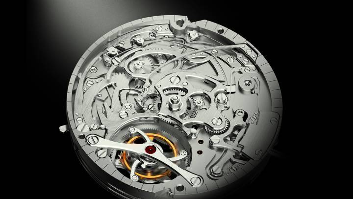 El hermoso calibre Concepto 08600, de cuerda manual, tourbillon, repetición de minutos con tres timbres. Numerosas personalizaciones posibles (incluido un tourbillon volante). Particularidad: el tren de ataque está regulado por un sistema de paletas, mientras que una innovación en la distribución de fuerzas proporciona una velocidad constante. El resultado son campanadas regulares de idéntica intensidad mientras suena el repetidor.