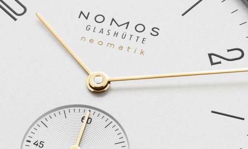 Nomos Orion neomatik doré y Tangente neomatik doré